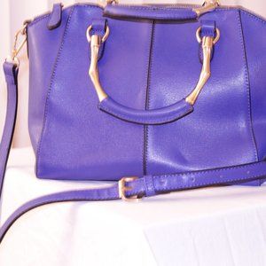 Indigo blue purse with strap and gold